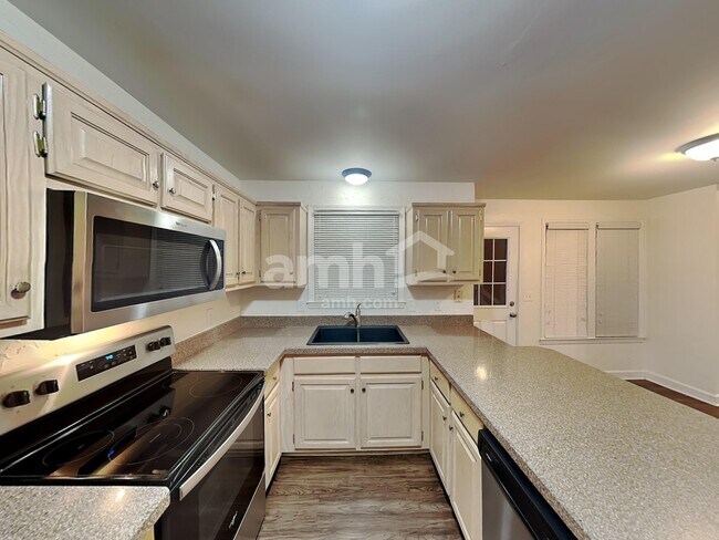 Foto del edificio - 4013 Windwood Ln