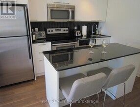 Building Photo - 775 King St W