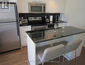 Building Photo - 775 King St W