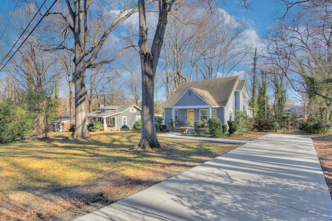 Building Photo - Step into this charming bungalow home, whe...