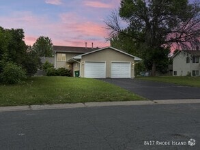 Building Photo - 8417 Rhode Island Dr N