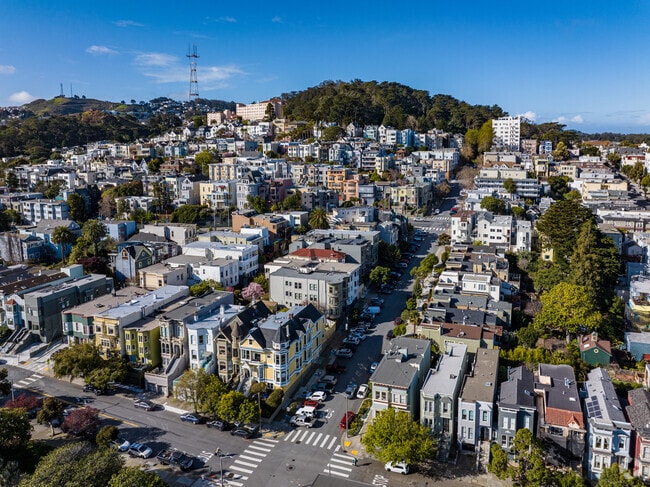 Old Victorian and Edwardian buildings line the streets of the Lower Haight.