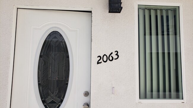 Building Photo - 2063 W Florence Ave