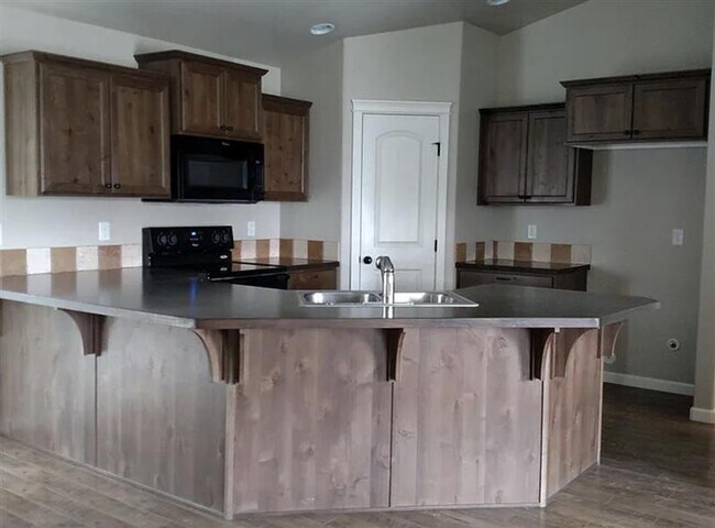Building Photo - A newer, 5 year old home, with open floor ...