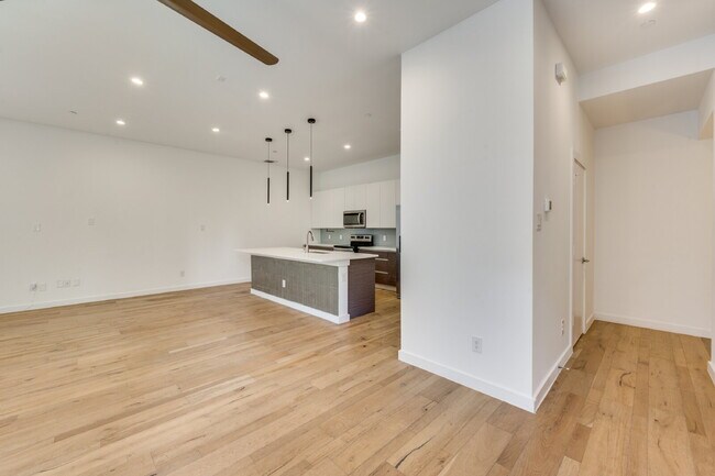 Photo - Live Above It All | Sleek Multi-Level Condo with Private Rooftop Deck