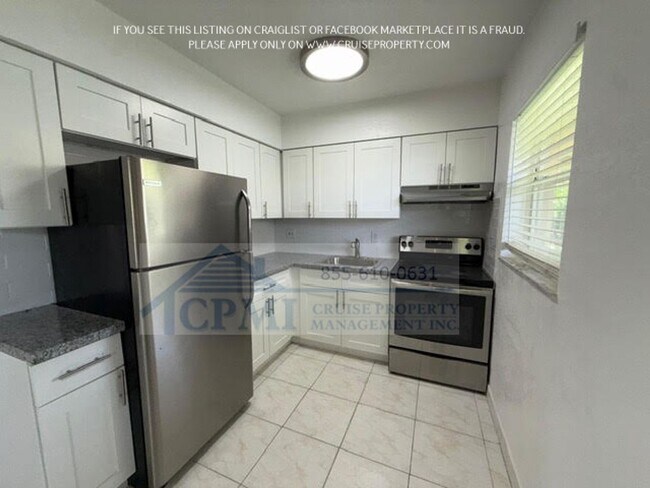 Foto del edificio - 497 NW 40th Ct