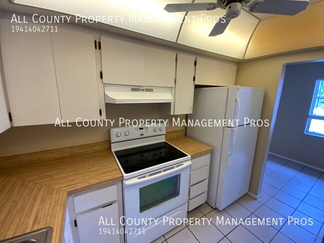 Building Photo - 7060 W Country Club Dr N