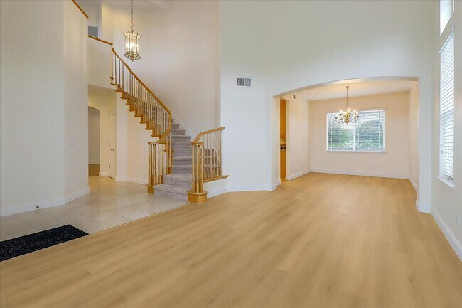 Building Photo - 4 Bed 3 Bath Home With 3 Car Garage High Ceilings And Fenced Yard