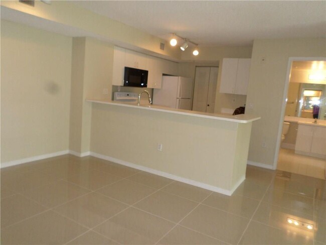 SO FLO Real Estate Group 3854 Lyons Rd # 206-5 COCONUT CREEK, FL - 3854 Lyons Rd