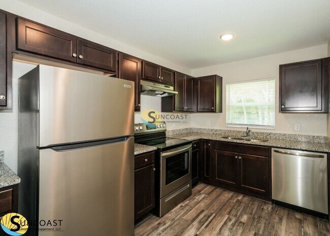 Building Photo - 9106 N Peachtree Way