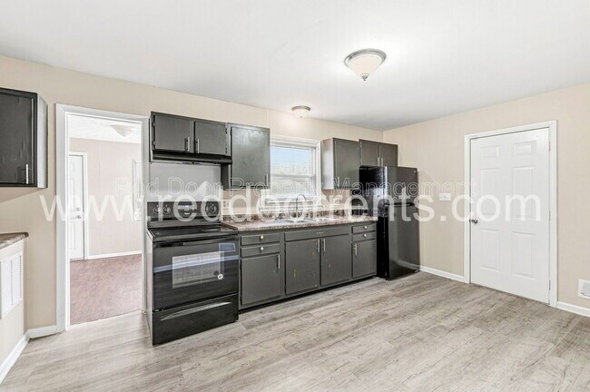 Foto del edificio - 5563 E 34th St