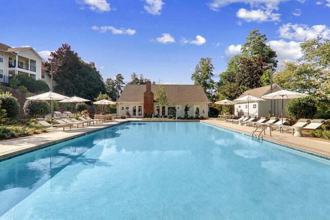 Resort-Style Swimming Pool with sun shelf - Caveness Farms
