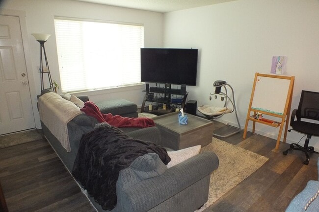 Building Photo - Spacious End-Unit 3-Bedroom Townhouse with 2-Car Garage & Central AC
