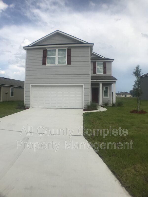 Foto del edificio - 6119 Bucking Bronco Dr