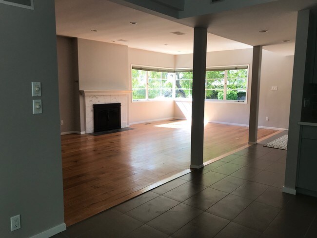 spacious living room with fireplace - 504 Beloit Ave