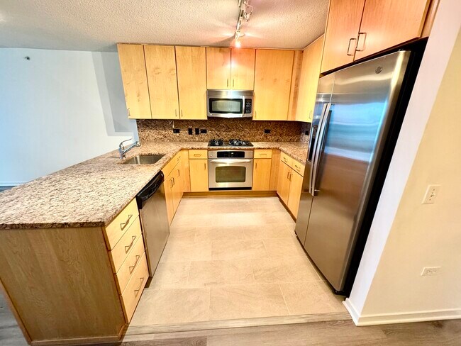 Foto del edificio - 9725 Woods Dr