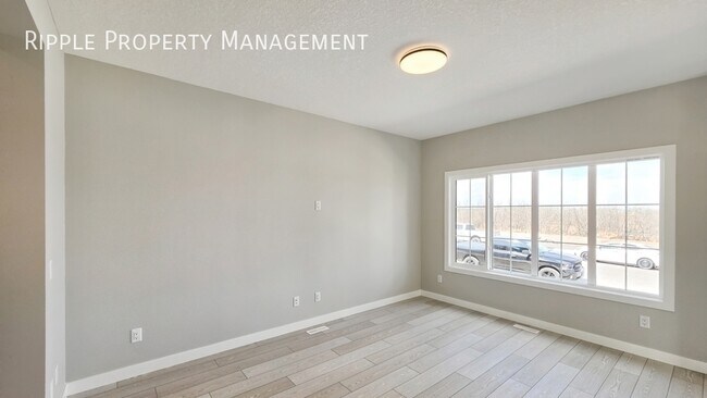 Building Photo - BRAND NEW 3 BEDS, 2.5 BATHS MAIN FLOOR | NEVER LIVED IN & MODERN FINISHES