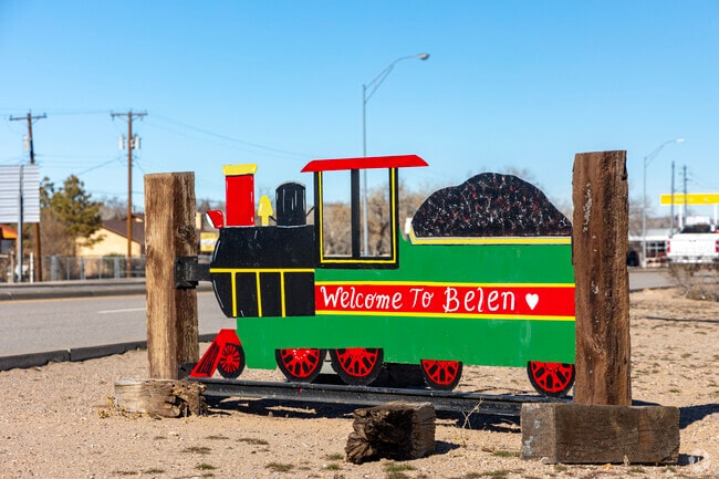 Quirky train sign with it's namesake town in Belen.