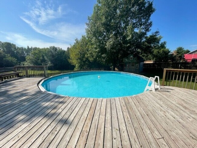 Building Photo - Gorgeous Walkout Basement Home with a Pool...
