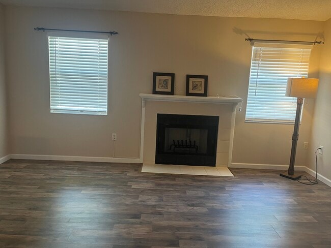 Living room with fireplace - 3782 59th Ave W