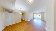 Located in South Miami, Unit E418 at 6640 S Red Rd is a thoughtfully designed single-floor residence that balances comfort and functionality. The open living and dining area greets you with warm hardwood-style flooring, neutral wall tones, and a pendant light fixture that anchors the space. A large sliding glass door fills the area with natural light and provides access to the outdoors, creating an airy, inviting atmosphere.

The kitchen is a standout feature, boasting rich dark wood cabinetry, granite-style countertops, tile flooring, and a full suite of stainless steel appliances including a refrigerator, range, microwave, and dishwasher. Track lighting above adds a modern touch.

The bedrooms are carpeted for comfort and each feature ceiling fans, natural light from window blinds, and closets with built-in shelving. One bedroom includes a spacious double-door closet, while another offers a built-in reach-in closet with upper shelving.

The bathrooms are finished with neutral tile, including a tub-shower combination with full tile surround. The primary bathroom features a dual-sink vanity with granite-style countertops and dark wood cabinetry, adding a refined, cohesive look throughout. The overall design is clean, well-maintained, and move-in ready.