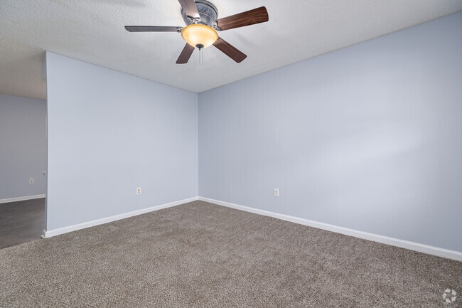 1BR, 1BA - 650SF - Living Room - Eagles Nest Apartments 62+ Community