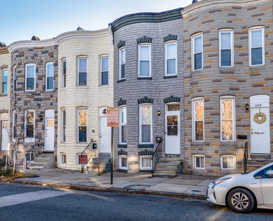 Primary Photo - Charming Urban Living: 2BR Townhome with M...