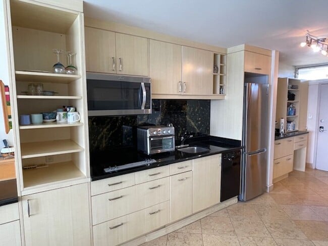 Building Photo - Spectacular Ocean Views - Fully Furnished Studio w/ Parking - San Souci