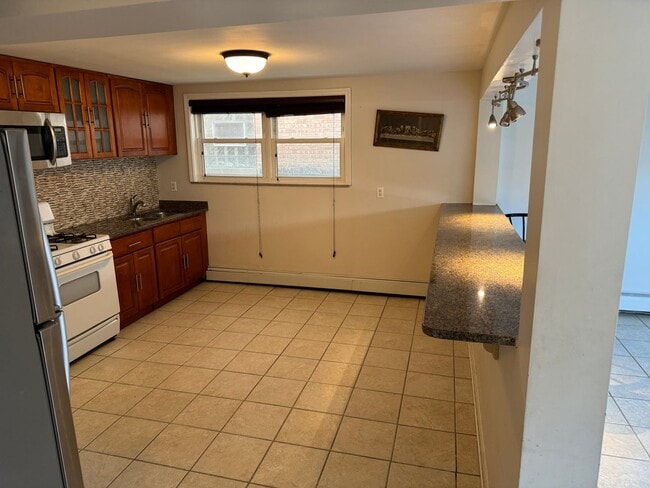 Building Photo - 5539 N Mango Ave