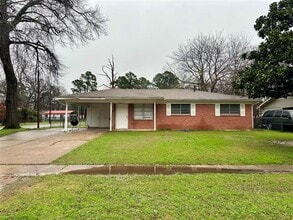 Building Photo - 7809 Woodfield Dr