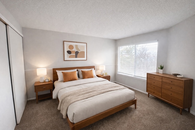 Building Photo - Charming 2 Bedroom Second Story Condo with easy access to everything!