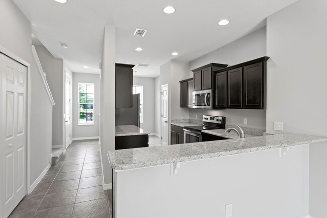 Building Photo - 4/2.5 Beautiful Energy Efficient Townhome ...