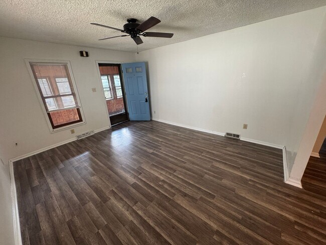 Building Photo - Character-Filled Akron Home with a Flexible Multi-Room Layout