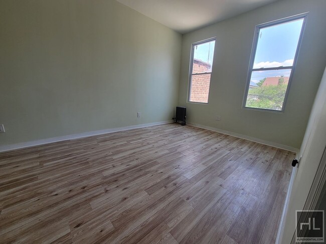 Building Photo - NEWLY RENOVATED TWO BEDROOM APARTMENT WITH...