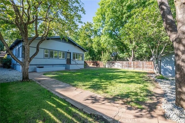 Backyard, entrance to basement apartment - 595 E 3rd St