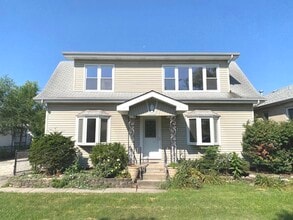 Building Photo - 4916 S Lorel Ave