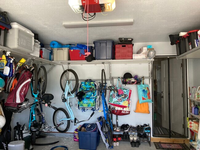 More garage storage and shelving - comes with extra refrigerator - 3728 Vintage Pointe Pl