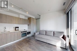 Building Photo - 50 Charles St E