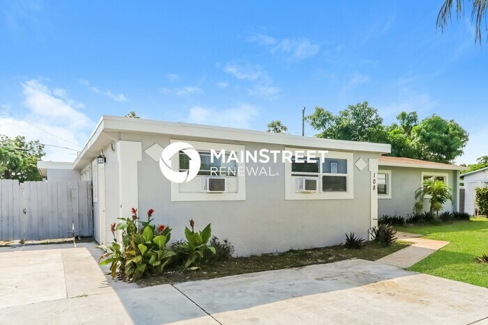Primary Photo - 4 Bedroom Pet-Friendly Home in Lantana, FL...