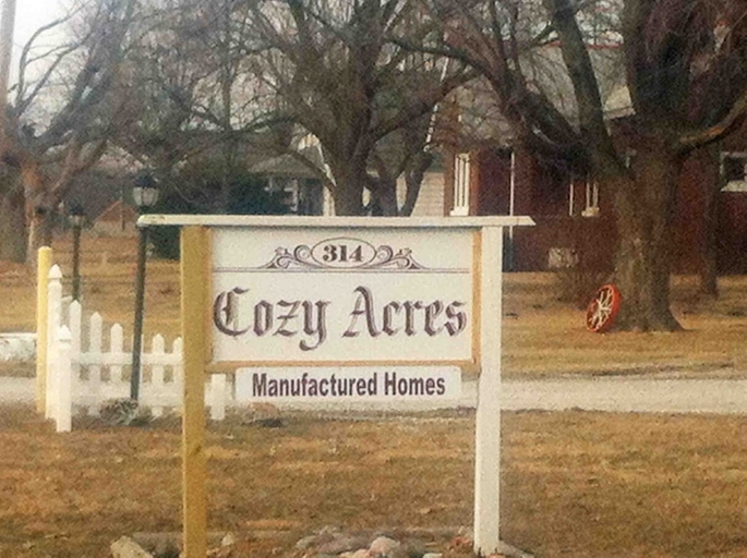 cartel de la calle. - Cozy Acres Manufactured Home Park