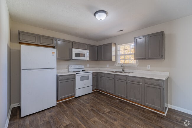2BR, 1BA - 977SF - Kitchen - Magnolia Village Apartments