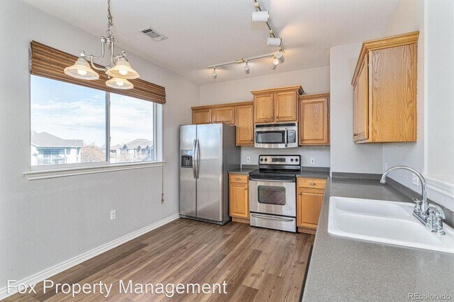 Building Photo - 3 br, 2 bath House - 3501 E. 103rd Circle ...