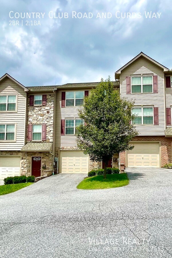 Building Photo - Spacious 2 bed, 2.5 bath Townhome with Gar...