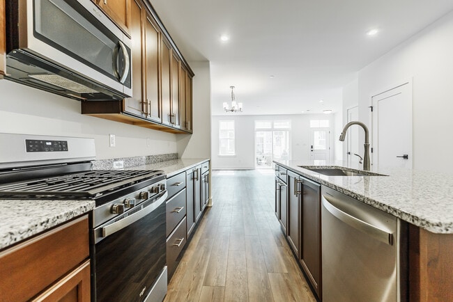 Kitchen + Great Room View - 7104 Donatello Dr