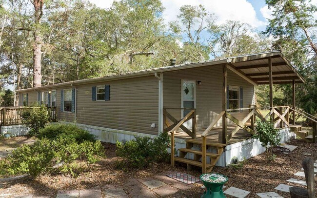 Building Photo - Peaceful 3 Bedroom Home just minutes to Li...
