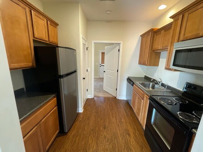 Foto del edificio - Old Main Condos 1BR | walking distance to Cotton District | Fall ‘26 AVAILABILITY