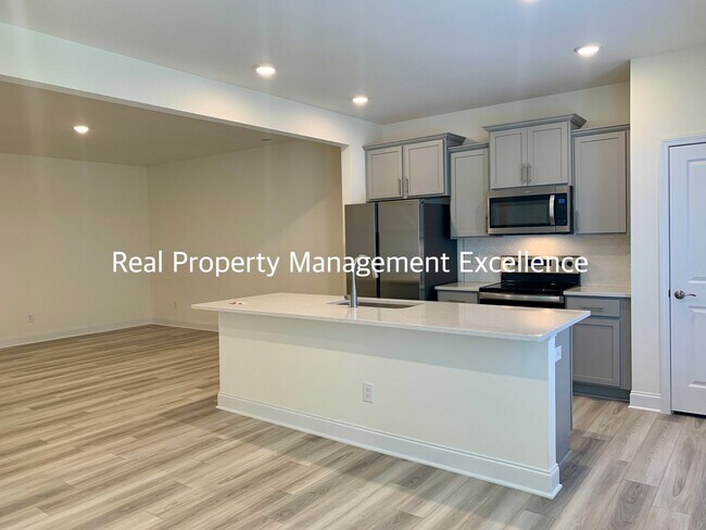 Building Photo - LUXURIOUS BRAND NEW TOWNHOME In Clayton, A...
