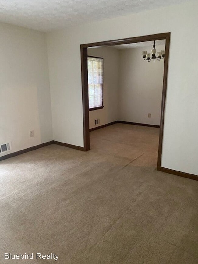 Building Photo - 4 br, 2.5 bath House - 7776 Morant Dr. - 7776