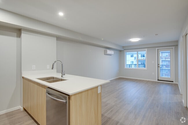 1BR, 1BA - 652SF - Kitchen and Living Area - Drinkwater Place Apartments