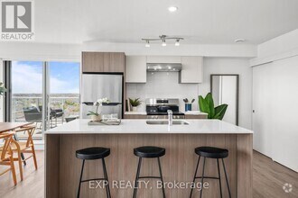 Building Photo - 100-100 Manett Crescent